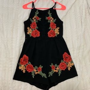 NWOT Black Romper with Flower Stitching Detail